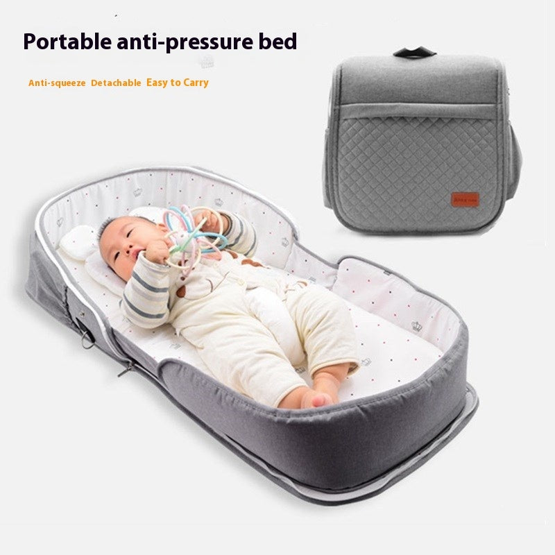Portable anti-pressure bed and an additional gray bag on a white background.